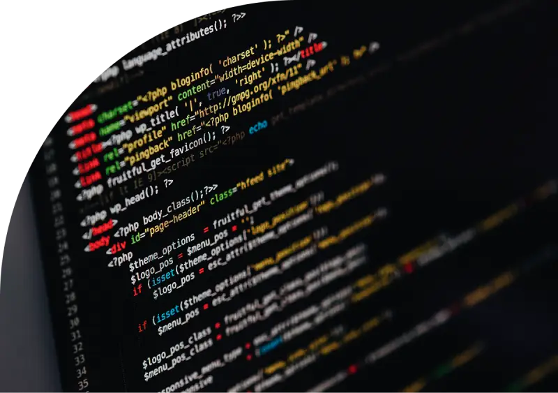 Close-up of colorful PHP code on a dark screen, showcasing web development and programming.